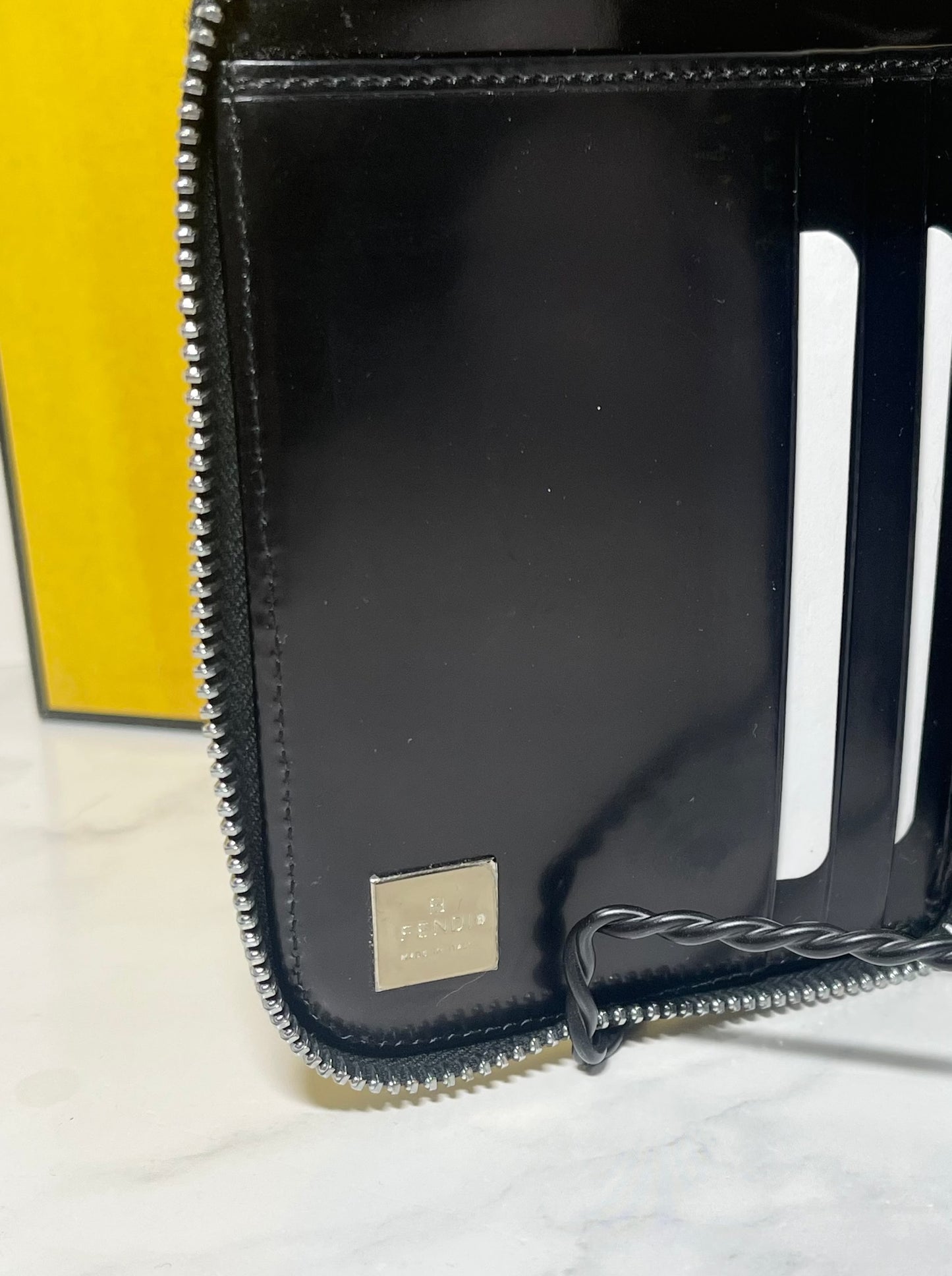 Fendi Embossed Bifold Zipper Wallet in Noir