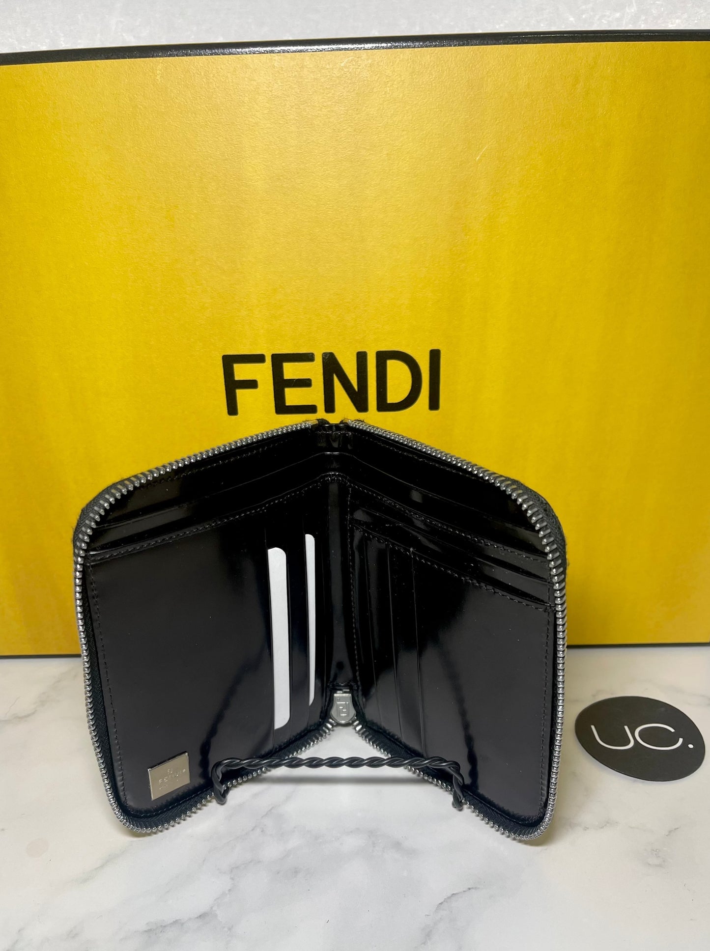 Fendi Embossed Bifold Zipper Wallet in Noir