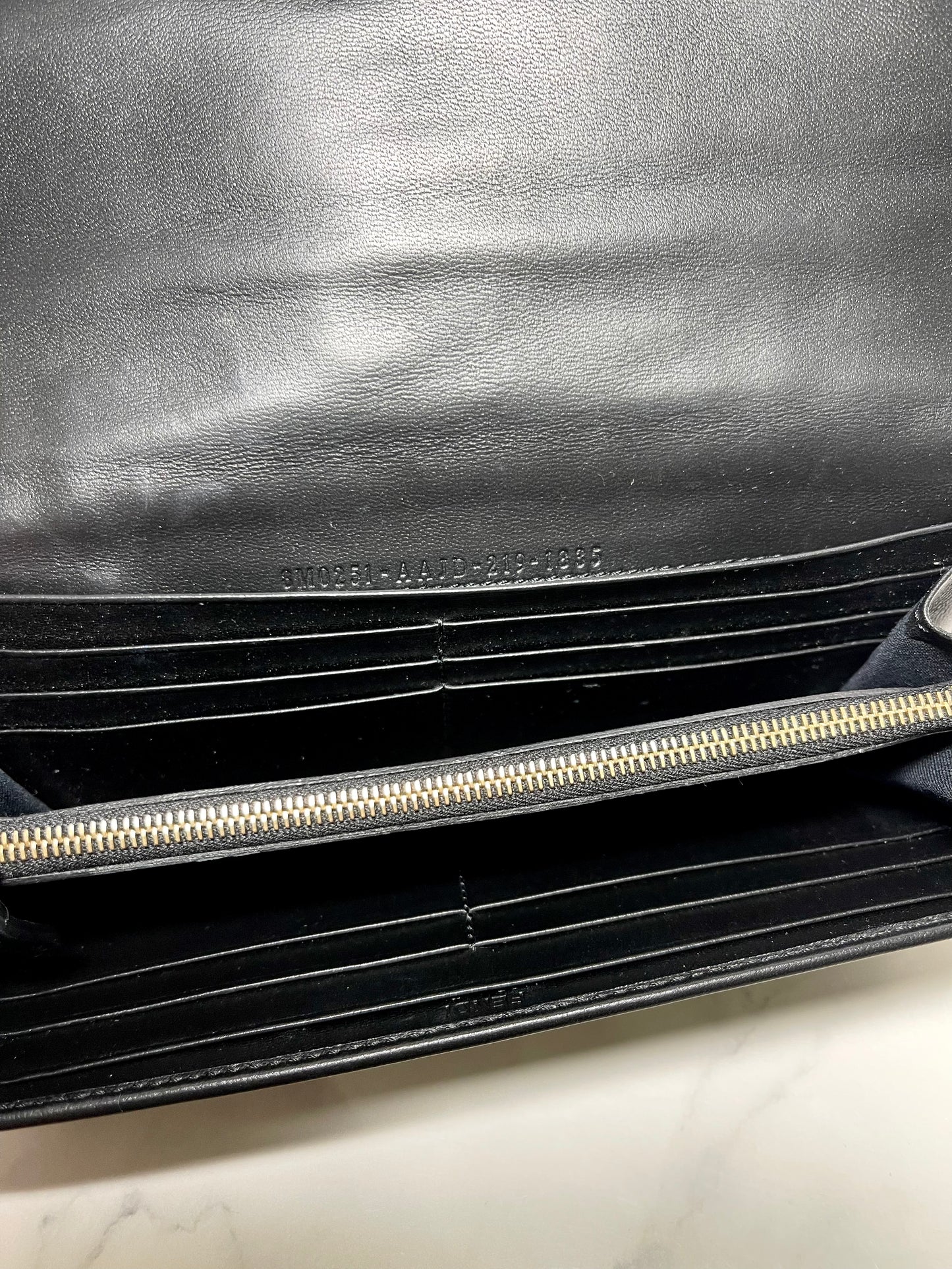 Fendi Logo Embossed Continental Wallet in Noir