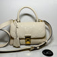 Louis Vuitton Madeleine BB Monogram Empreinte Leather in Creme