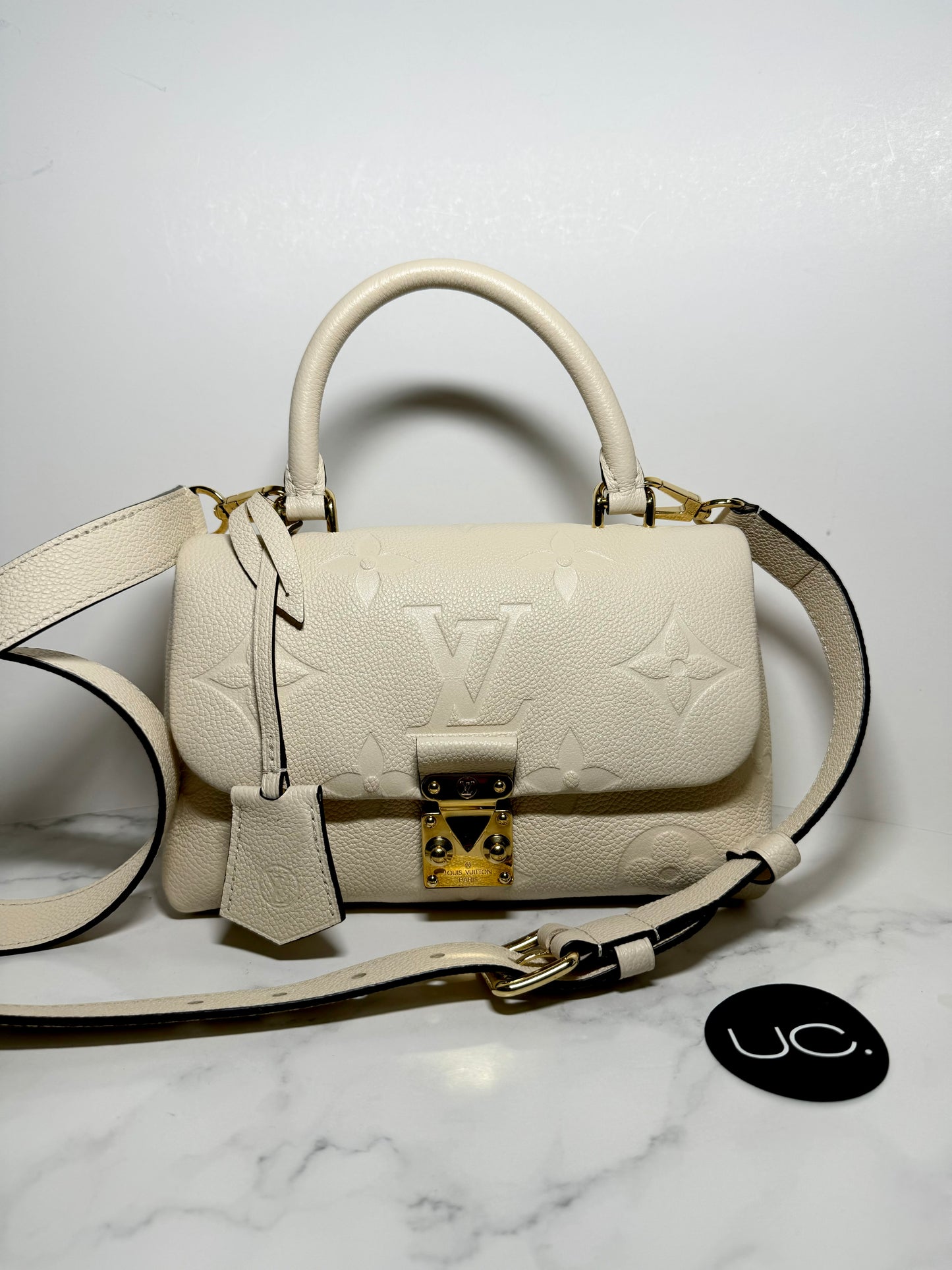 Louis Vuitton Madeleine BB Monogram Empreinte Leather in Creme