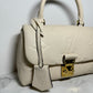 Louis Vuitton Madeleine BB Monogram Empreinte Leather in Creme