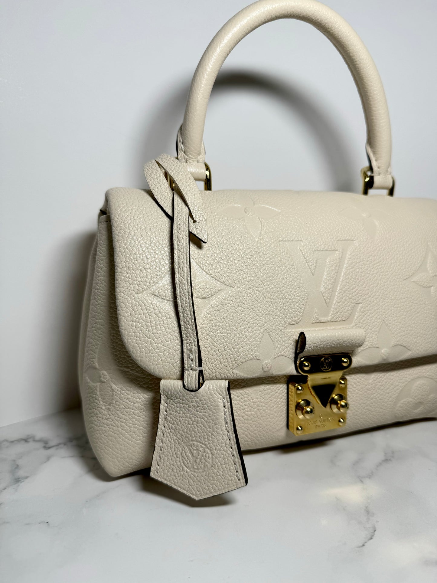 Louis Vuitton Madeleine BB Monogram Empreinte Leather in Creme