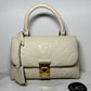 Louis Vuitton Madeleine BB Monogram Empreinte Leather in Creme