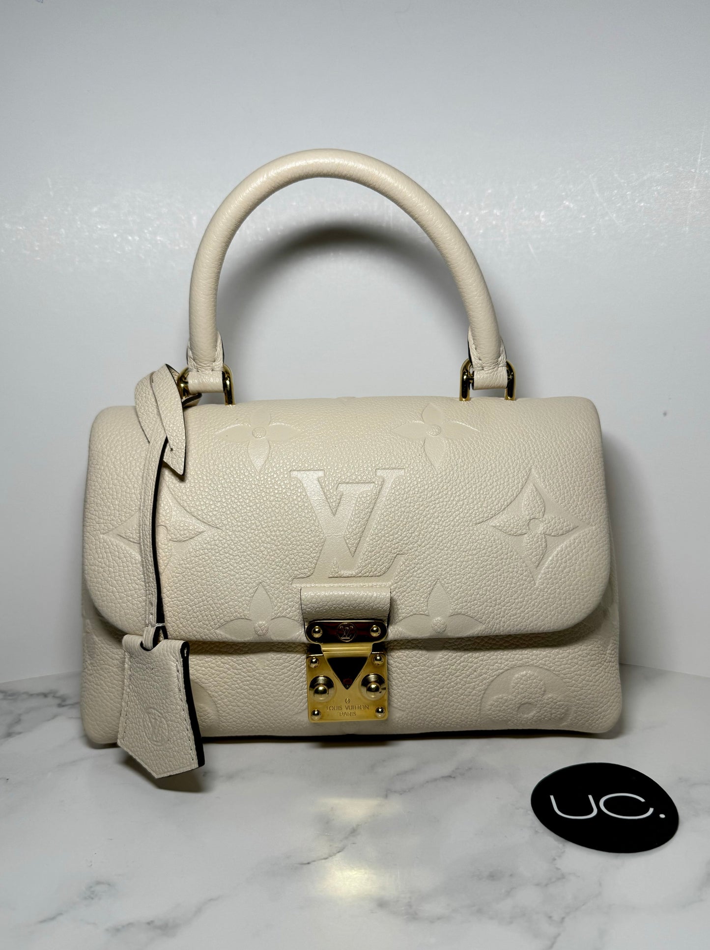 Louis Vuitton Madeleine BB Monogram Empreinte Leather in Creme