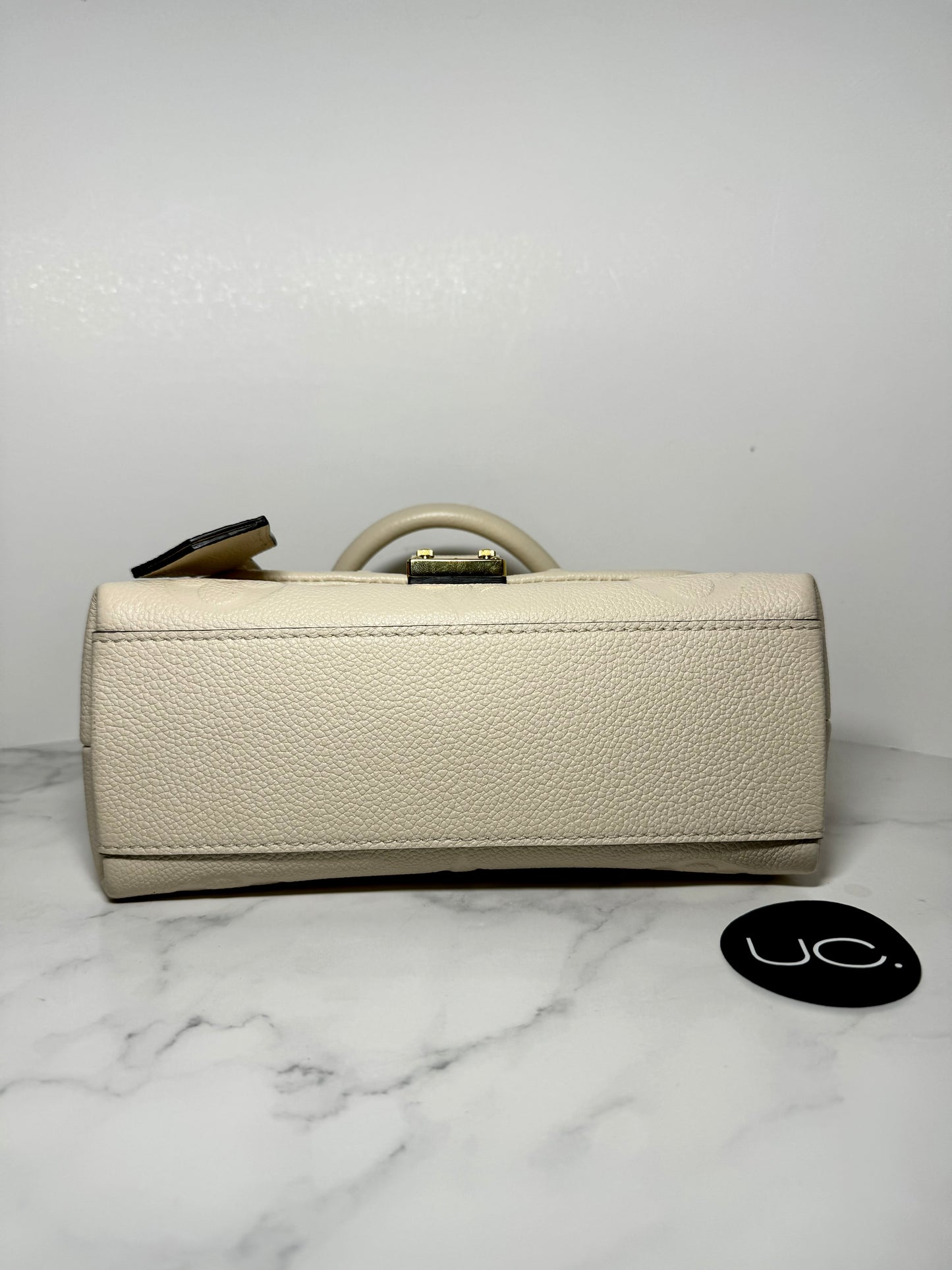 Louis Vuitton Madeleine BB Monogram Empreinte Leather in Creme