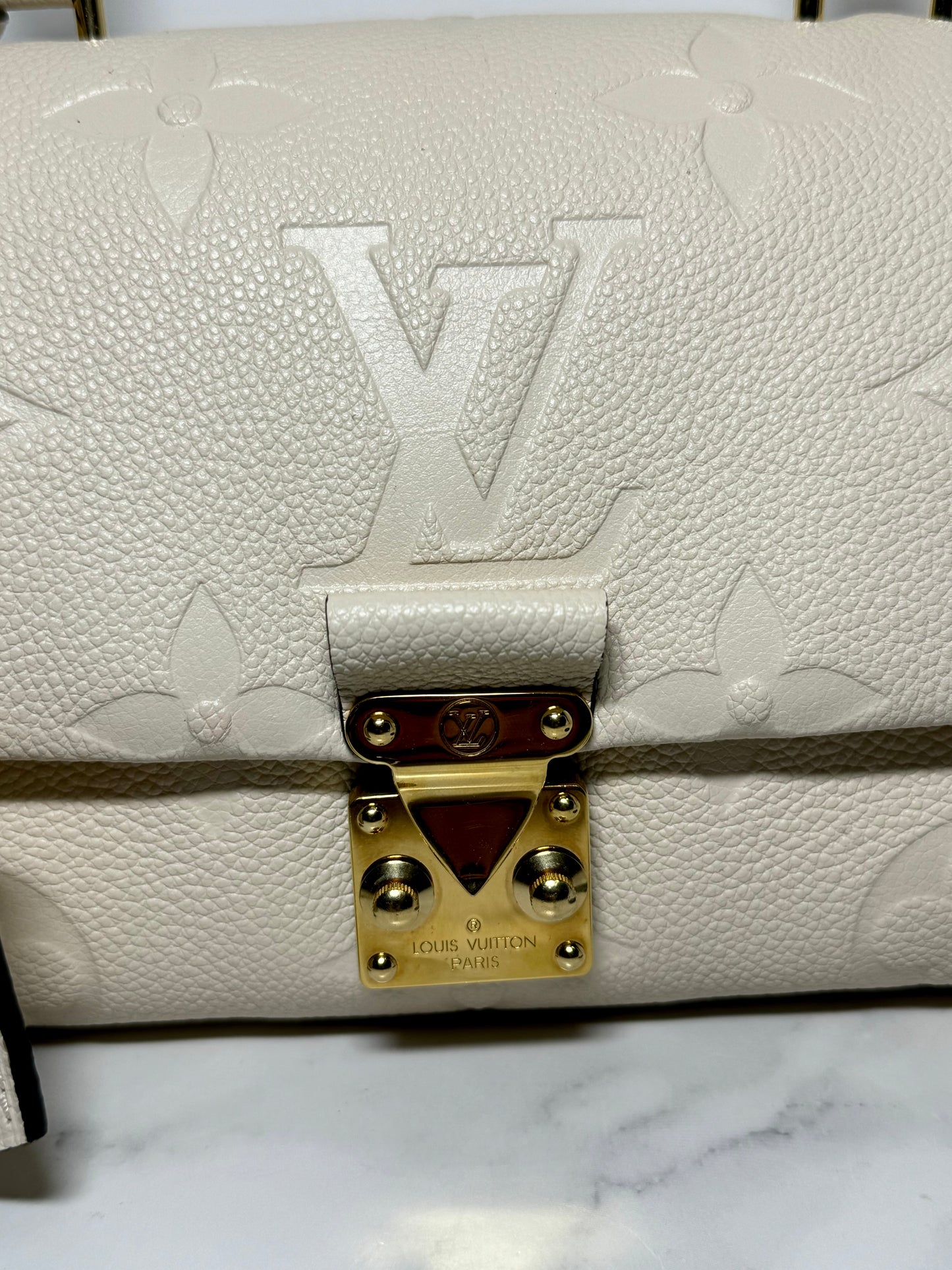 Louis Vuitton Madeleine BB Monogram Empreinte Leather in Creme