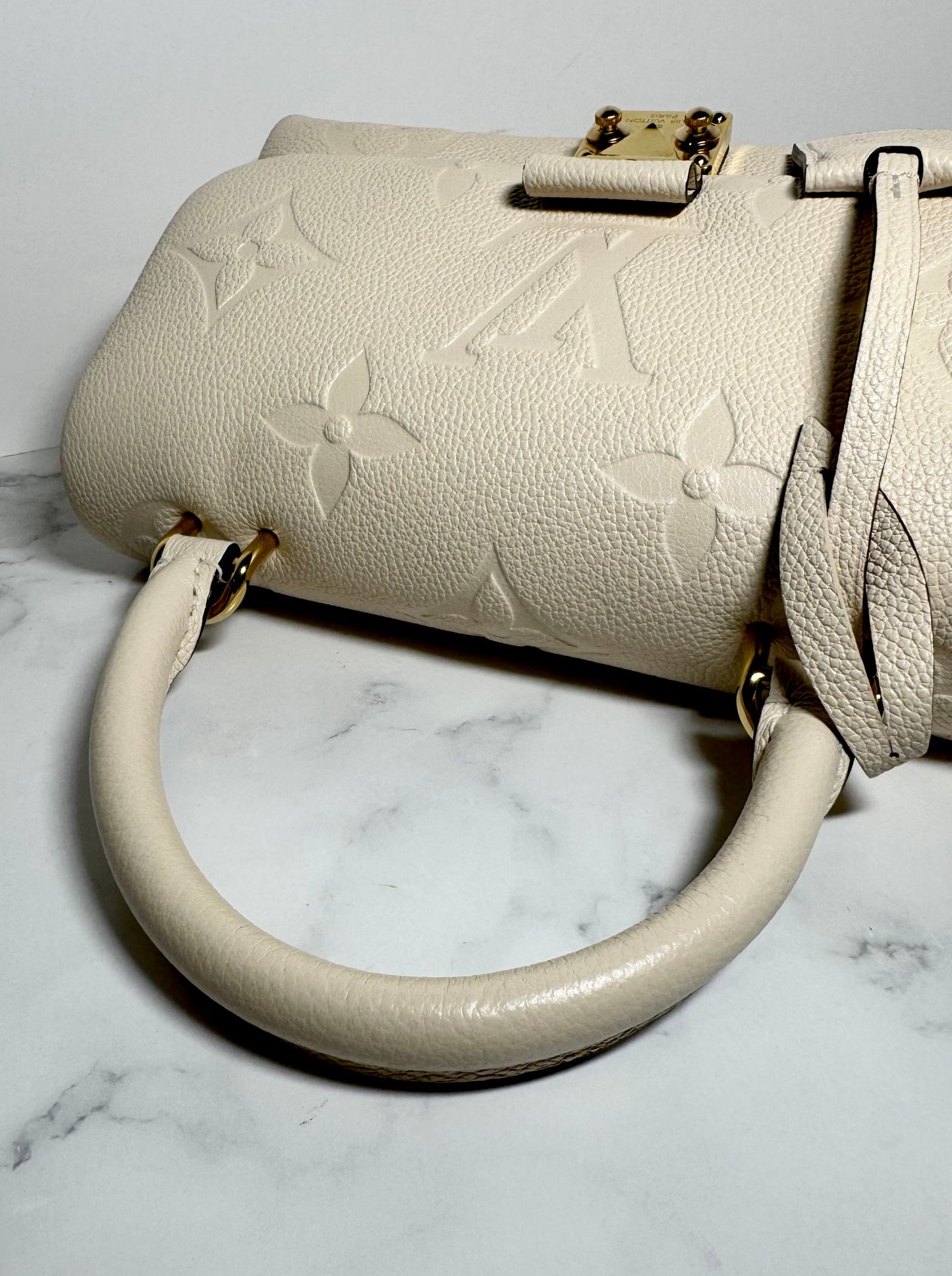 Louis Vuitton Madeleine BB Monogram Empreinte Leather in Creme