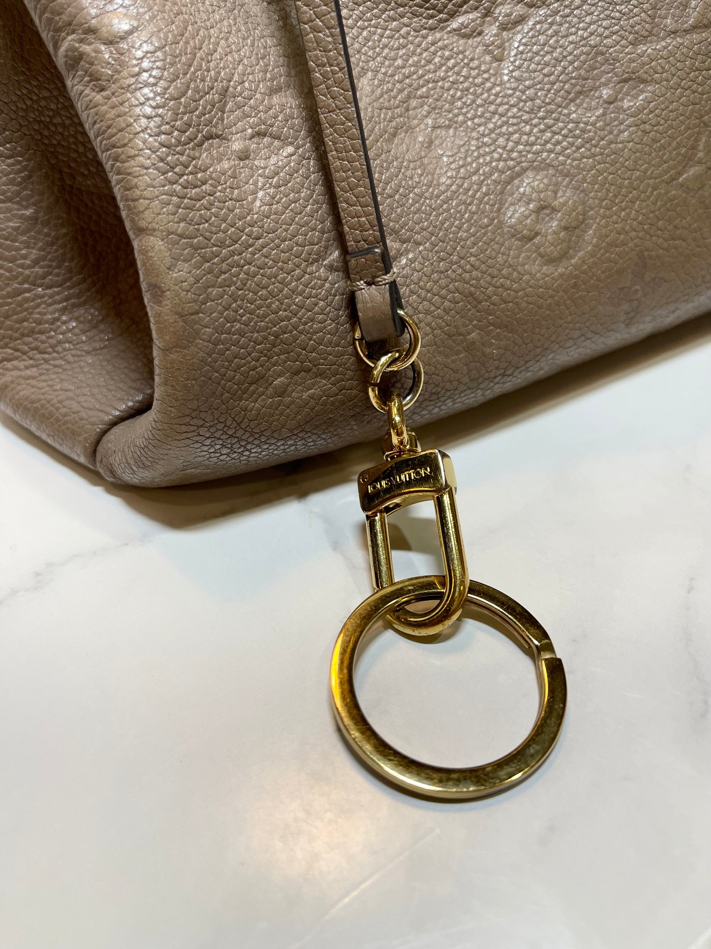 Louis Vuitton Artsy Monogram Empreinte MM in Turtledove